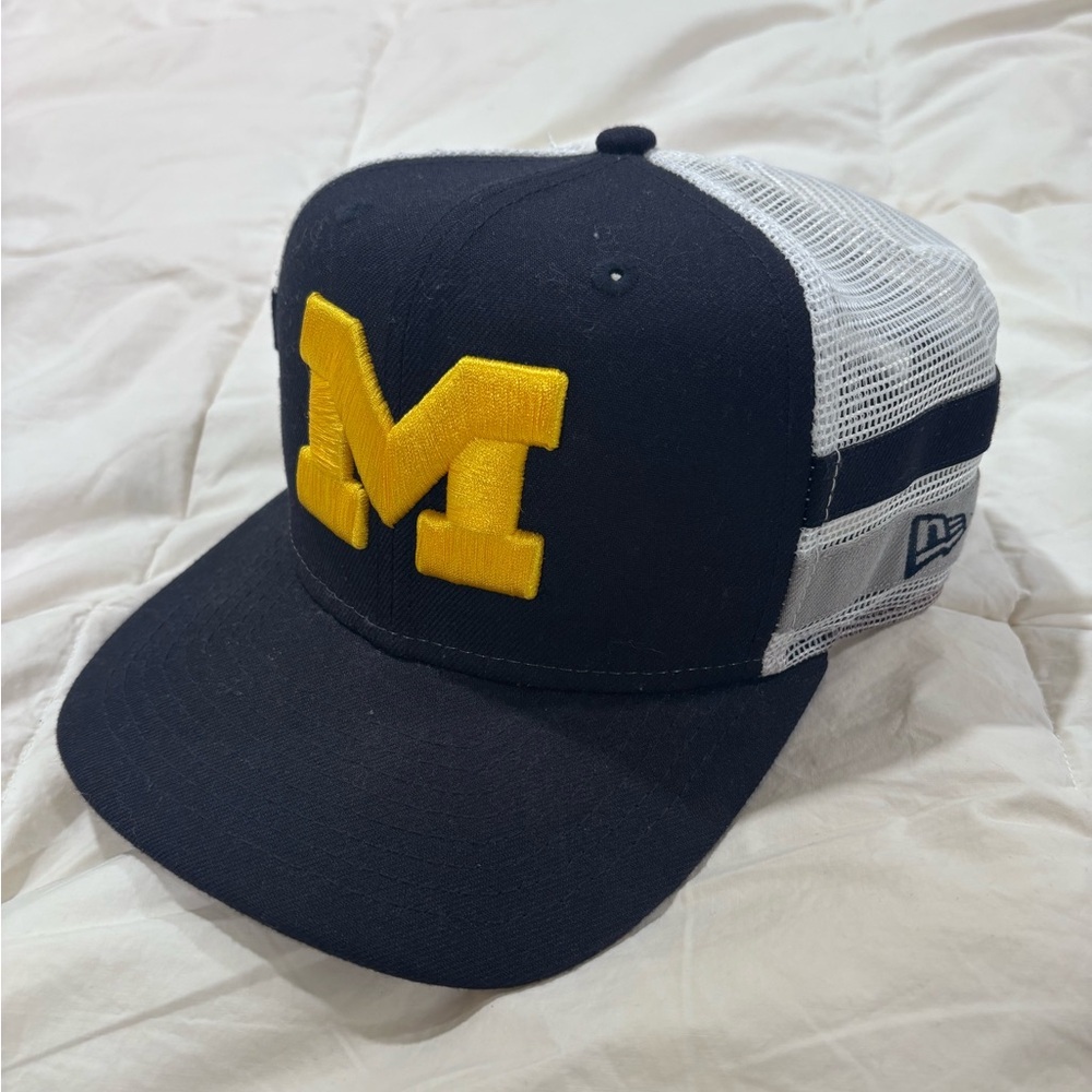 New Era Navy and Yellow Michigan M Trucker Hat